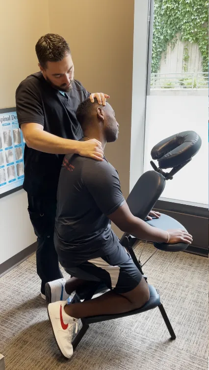 Chiropractor treating neck tension for headaches at Chiro 1st