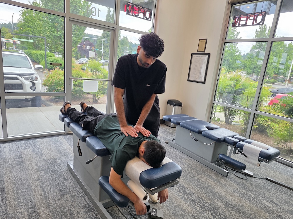 Chiro 1st chiropractor performing a spinal adjustment