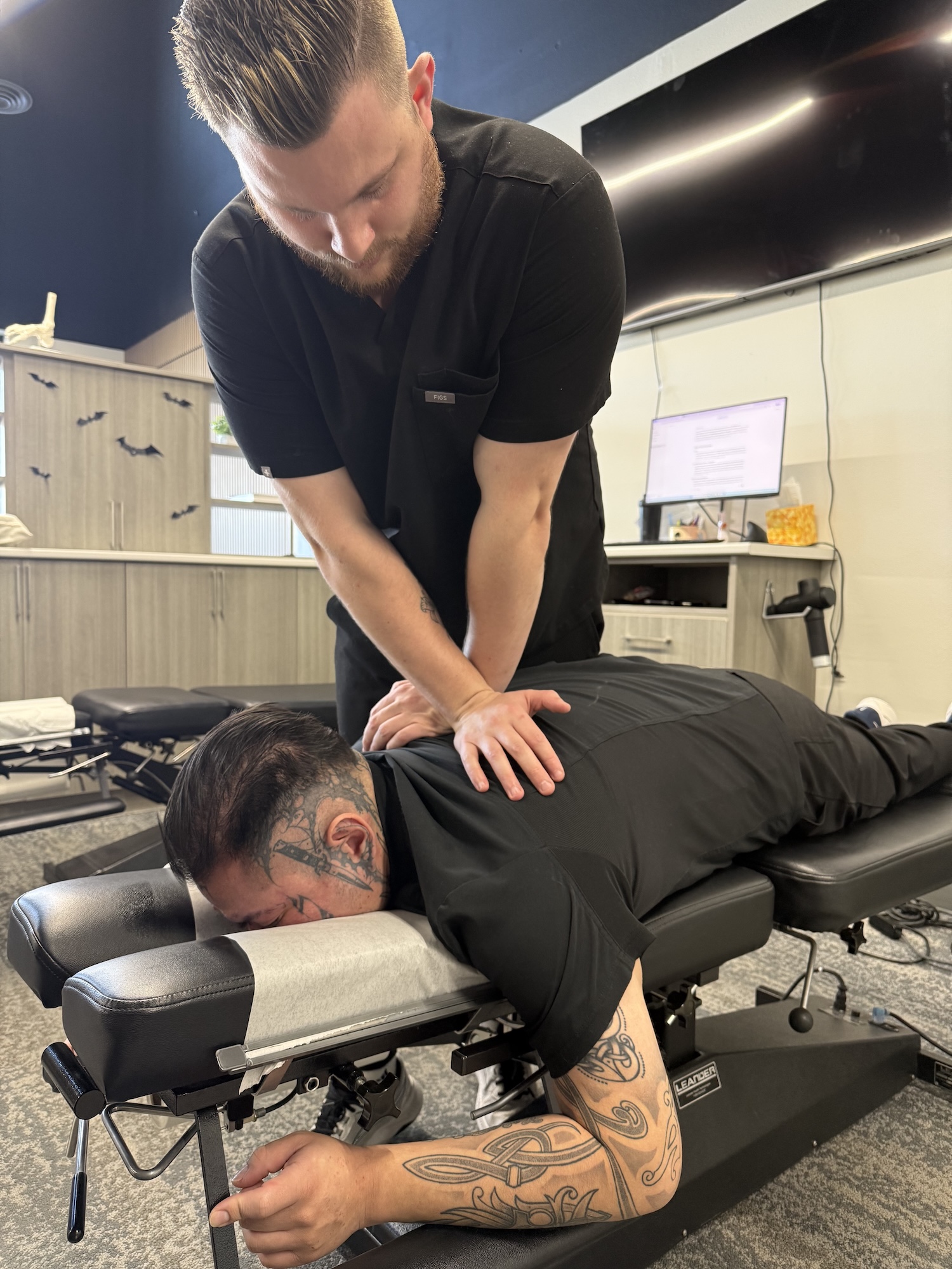 Chiropractor treating a patient after a car accident at Chiro 1st