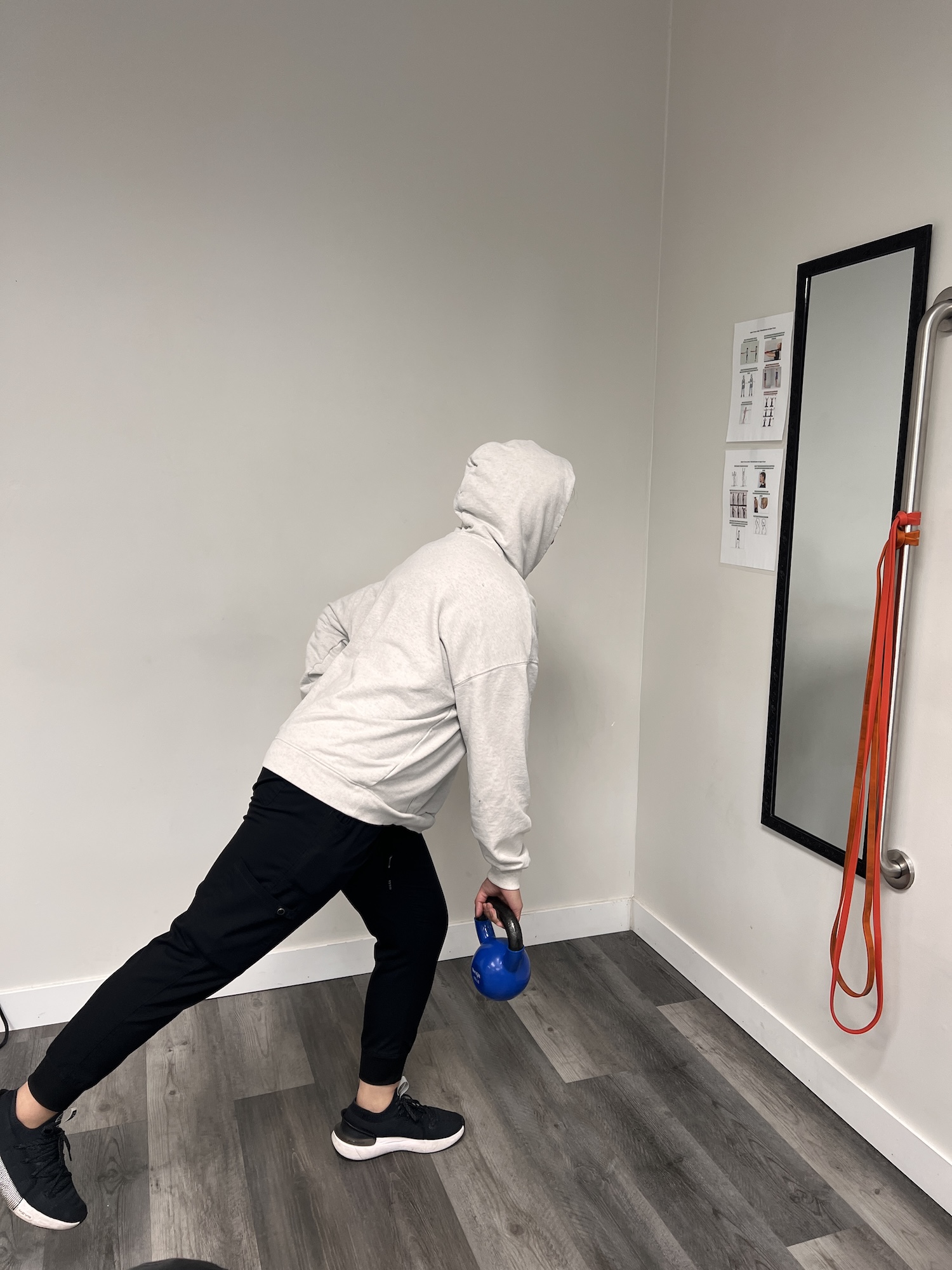 Patient doing a rehab exercise for a work injury at Chiro 1st