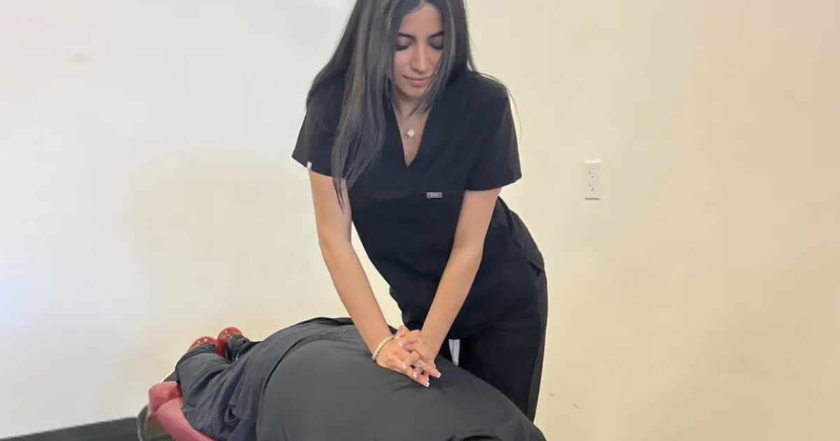 Patient receiving chiropractic care for back pain at Chiro 1st